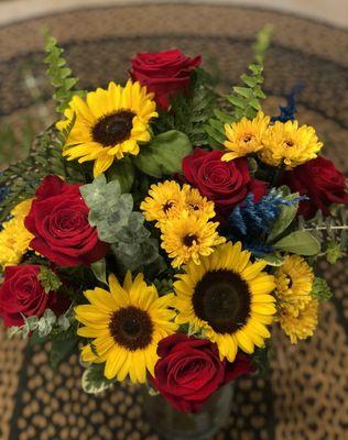 A favorite. Red roses with sunflowers