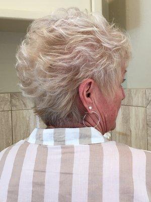 Short layered haircut styled back