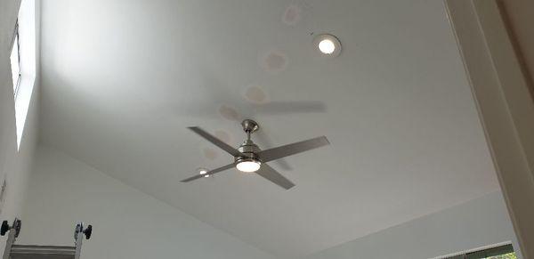 New installation of recessed lighting and ceiling fan.