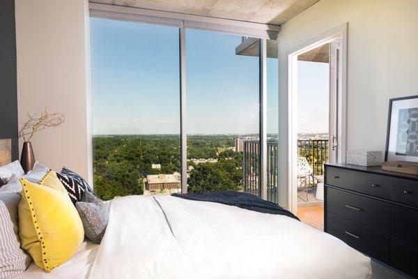 Floor-to-ceiling windows with solar shades