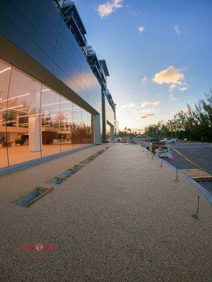 Resin Stone Installation in Car Dealership - Artistic Concrete Group