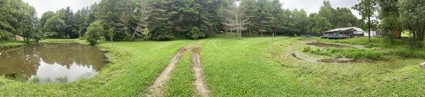 panoramic photo of the side of the pond by the cabins!