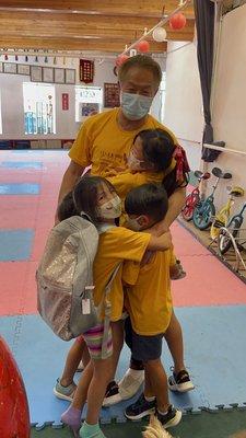 Giving master Zhong a big hug on the last day of camp.