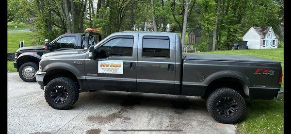 One of our service trucks ready to help with all your needs, jump starts, lock outs,