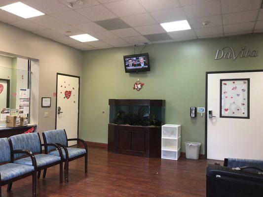 Waiting area along with fish tank and television