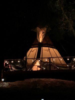 26' Tipi with huge deck by night