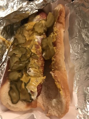 Hot dog, mustard, mayo and pickles.