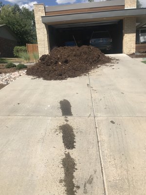 Oil spill in drive and mulch blocking my car