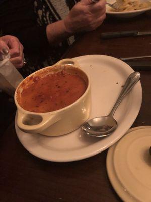 Tomato soup with seasoned crackers.