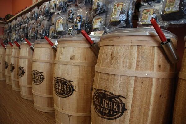 Beef Jerky Outlet barrels and hung jerky