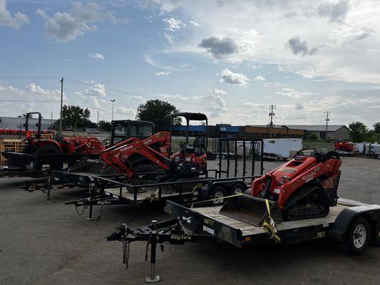 From left to right: Kubota 27hp Tractor, Kubota SVL75, Kubota U17, and Kubota SCL1000