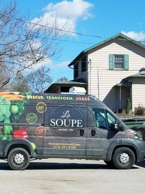 Delivery van in front of La Soupe on a beautiful, sunny day