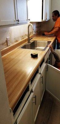 Before in kitchen. 32 year old Formica. You can't tell but it was chipped and dirty since I reno'd without covering-knowing I'd be replacing