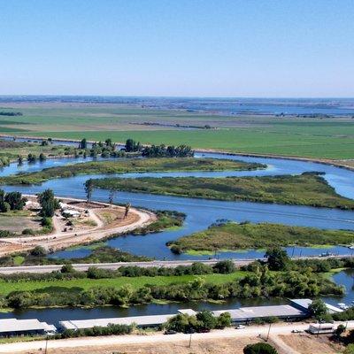 Aerial of Cruiser Haven with the beloved Delta in the background. We have covered boat slips, in a secluded cove and we are on fast water.