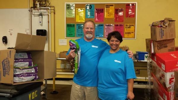 Bill and Deanna volunteering at Harvesters for Express' Brand it Blue Day!