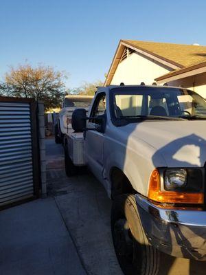 Costumer need his monster truck moved from driveway to the side of his house.