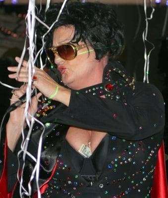 Elvis' Secret Dyke Daughter makes an appearance at a She She New Year's Eve party.