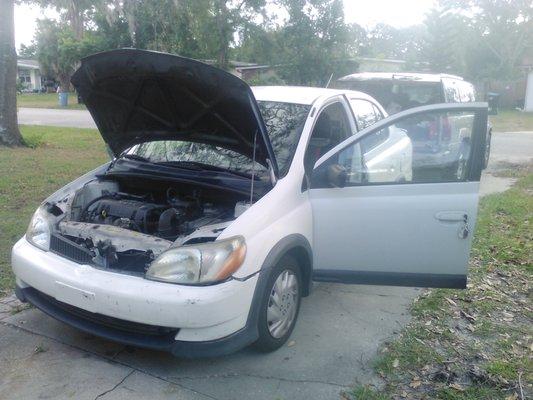 This 2006 Toyota Echo needed a little bit of love due to a horrible misfire. A few twists of the ratchet, new plugs were put it fast.