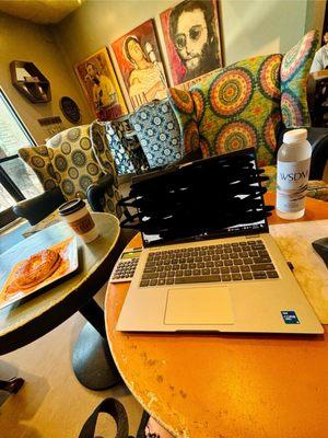 Jalapeño cream cheese bagel with a vanilla banana  latte... great working environment