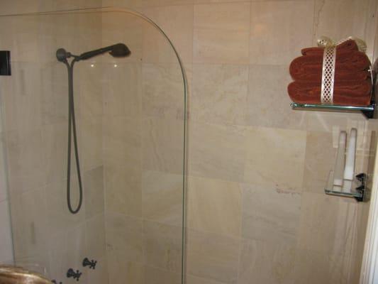 Added new shower door and glass shelves in the shower.  Love it!