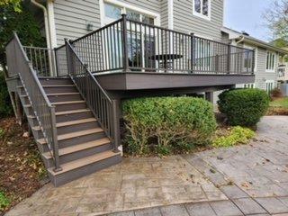 Condo mid-level deck rehab project. Went from cedar to all composites. Wolf brand PVC Amberwood main color with Black Walnut Trims. Lighting