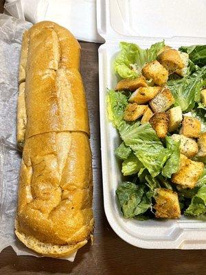 Garlic bread and Caesar salad on right