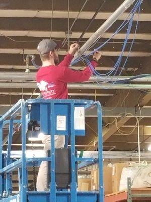 Working on structed wiring install in manufacturing facility.