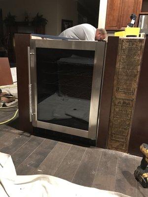 Custom wine fridge cabinet