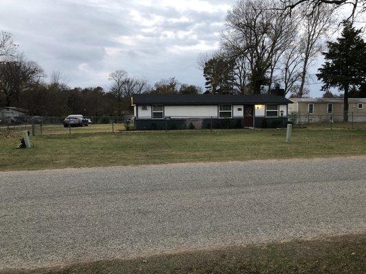 Two of the three cable boxes in my yard that Cherokee telephone co of calera put there. There is one on side. A total of three in yard.