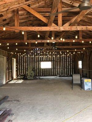 Owners Private Barn Venue with inviting lights and fan setup in Calistoga.