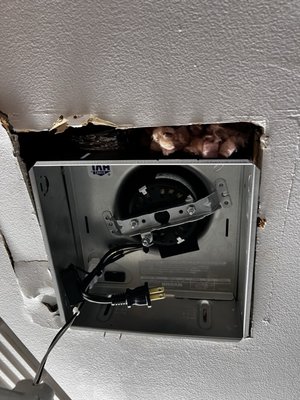 The bathroom exhaust fan he installed very poor job left the