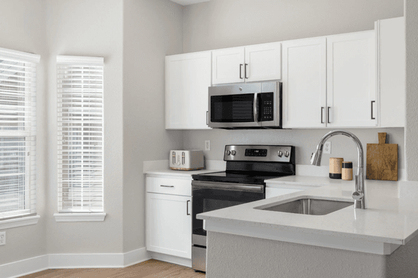 Kitchen - The Grove at Cherry Creek Park Apartments