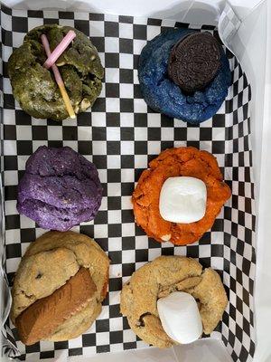 6 cookie assortment: clockwise from top left- matcha, Oreo, birthday cake, graham ctacker, cookie butter, Ube