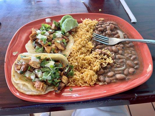 Chicken Soft Tacos, rice, and beans.