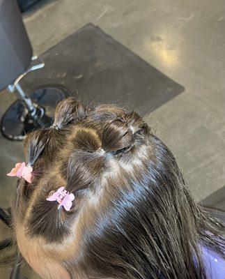 Party hair cut styled and comes with a tattoo, toy and treat