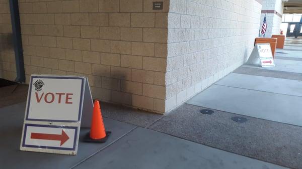 Directional signs in courtyard