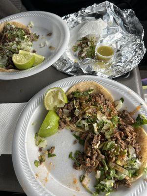 Carne asada tacos with lots of meat.