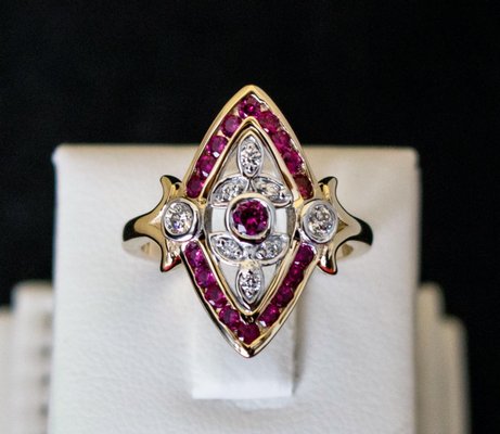 Vintage inspired design featuring rubies and diamonds.