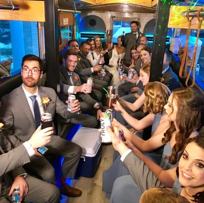 Wedding party on the trolley - The 312 Limo https://www.the312limo.com/limo-bus/