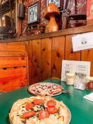 Inside restaurant booth area, collection of antiques