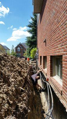 Foundation wall in West Bloomfield primed and ready for membrane.