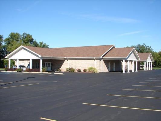 Building and large parking lot