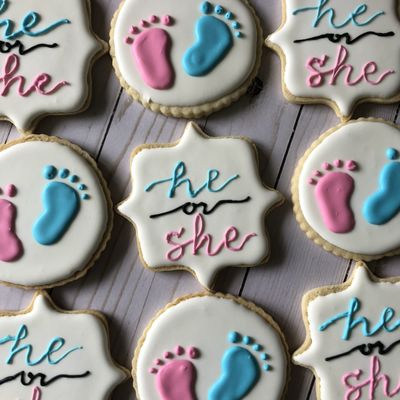 Hand decorated royal icing cookies for a gender reveal