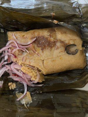 Classic Peruvian pork tamal