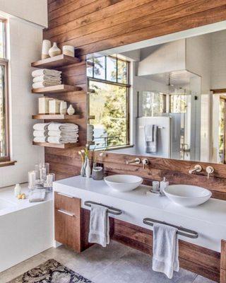 Gorgeous bathroom designed by Associates III Interior Design. Large format floor tile from Decorative Materials.