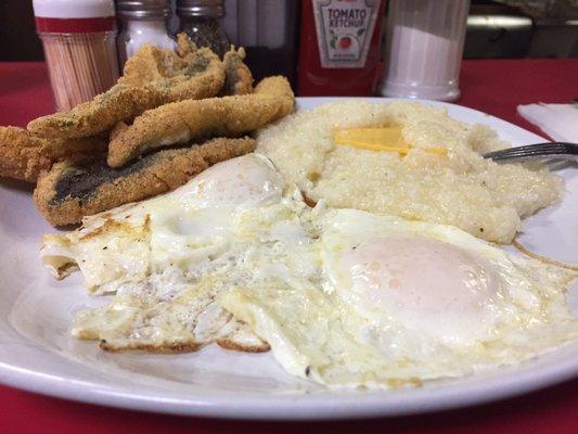 Fried whiting, cheese grits, and eggs over easy.