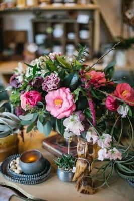 Fresh arrangement in footed vase.