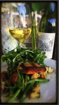 Bronzino with Potatoes, Haricot Vert and Baby Arugula with citrus essence.