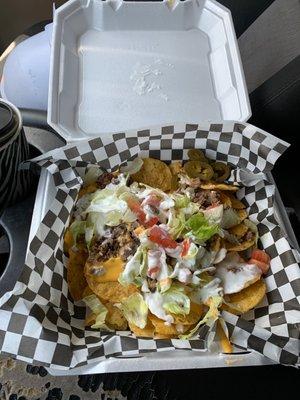 $15 for the nachos and a drink. Not much cheese for the amount of chips they give. Oh and to top it off took a hour for me to get my order