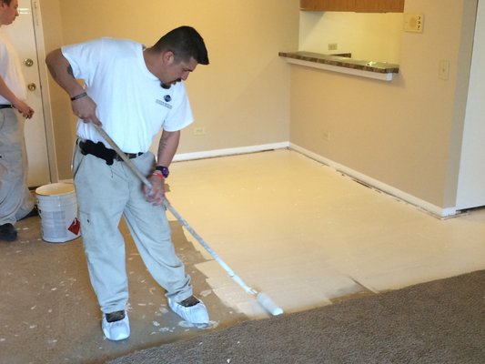 Sealing Subfloor of urine damaged property.  This prevents odors in subfloor from reoccurring when new carpet is installed